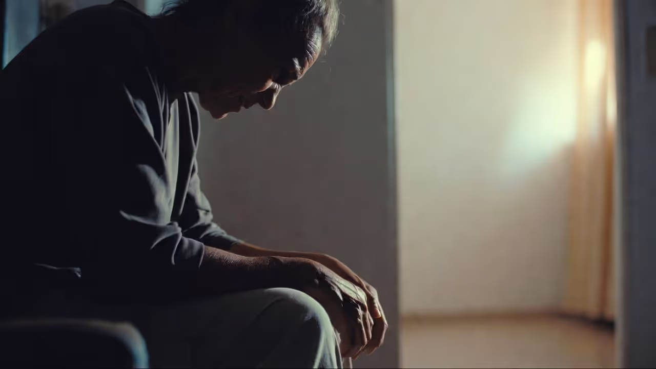 Adult appearing withdrawn and hesitant in a social or work setting