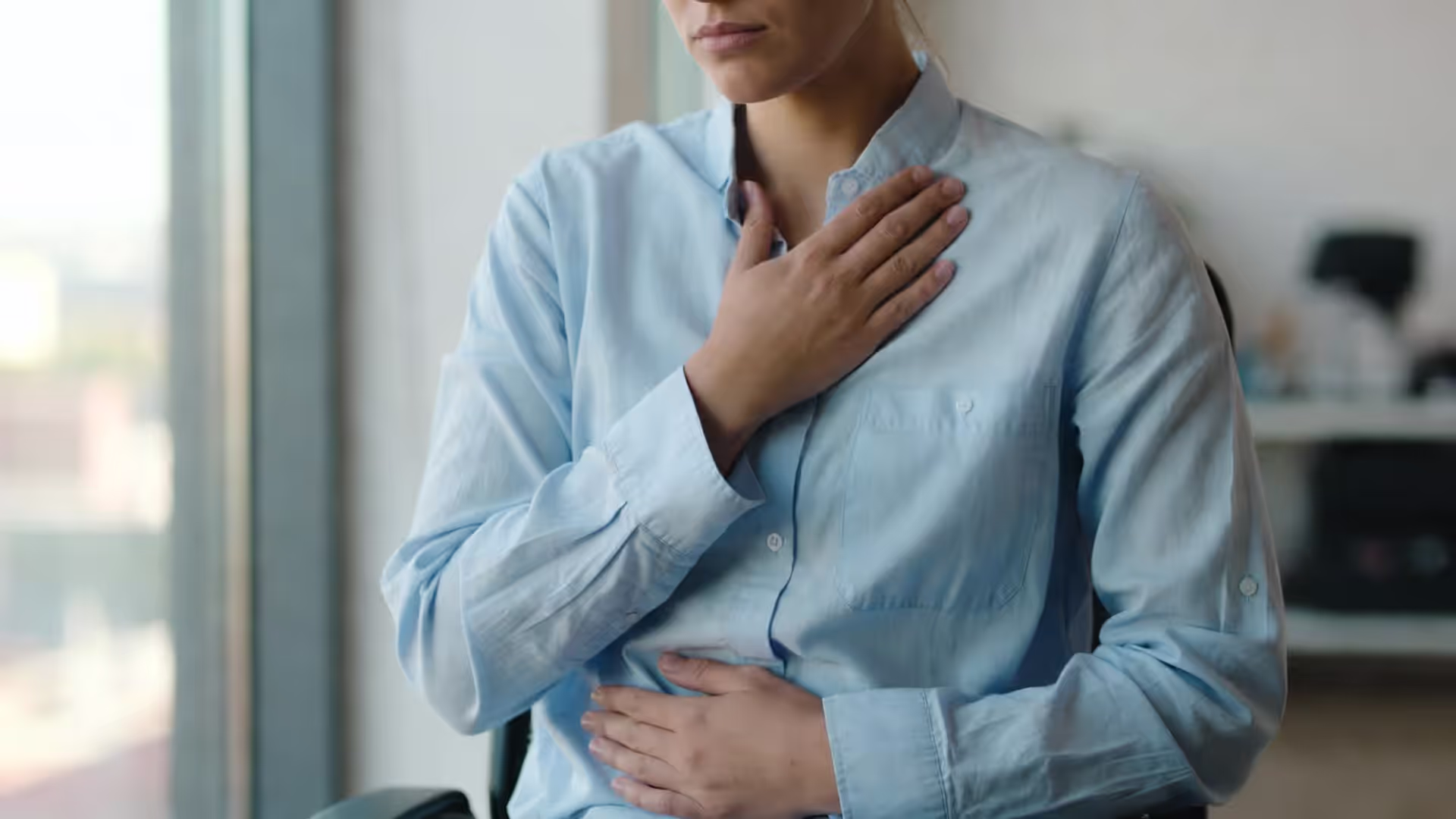 Self soothing practice with hand on chest and calm breathing